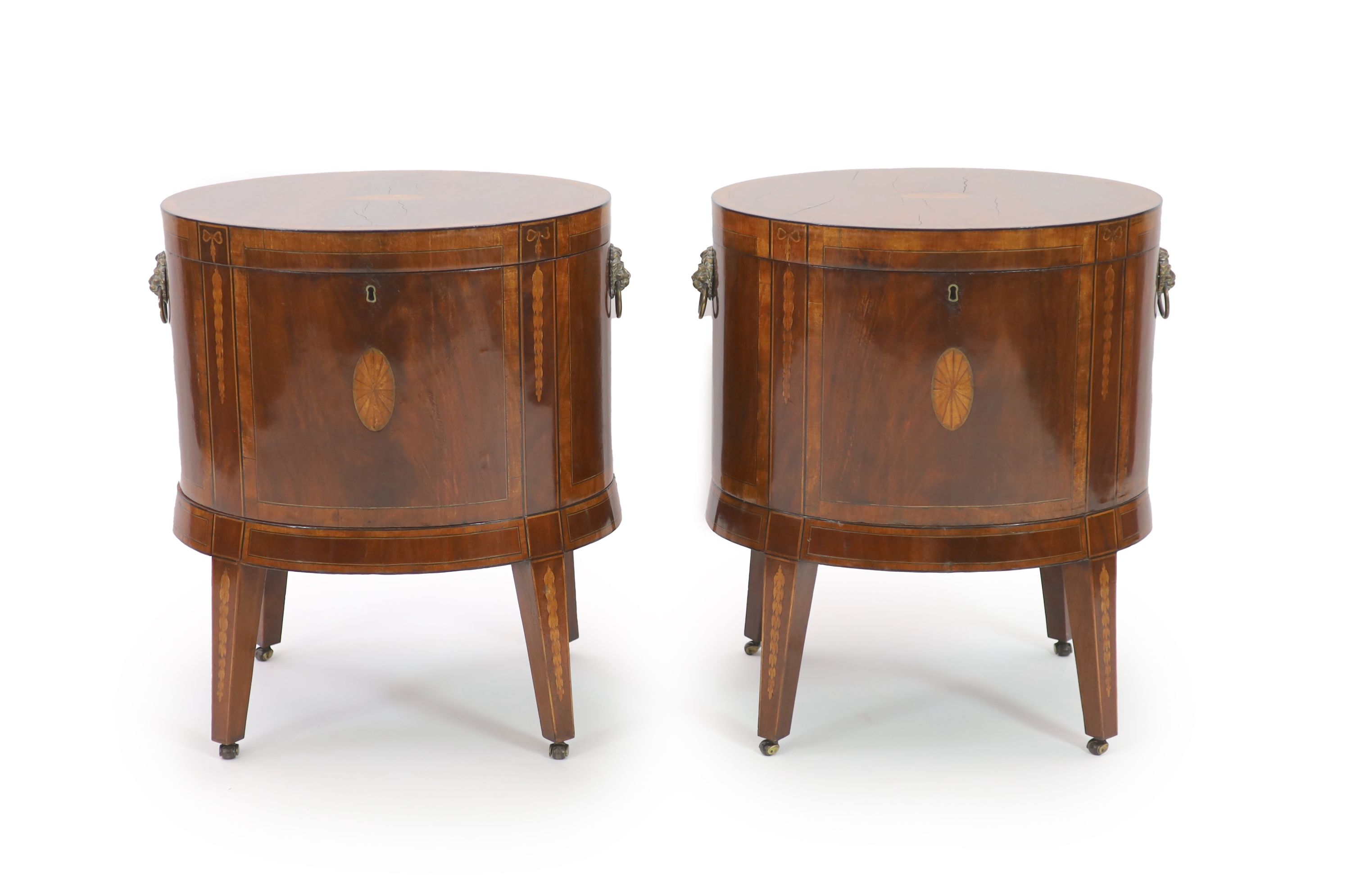 A pair of George III Sheraton style oval inlaid mahogany cellarets, W.64cm D.46cm H.68cm